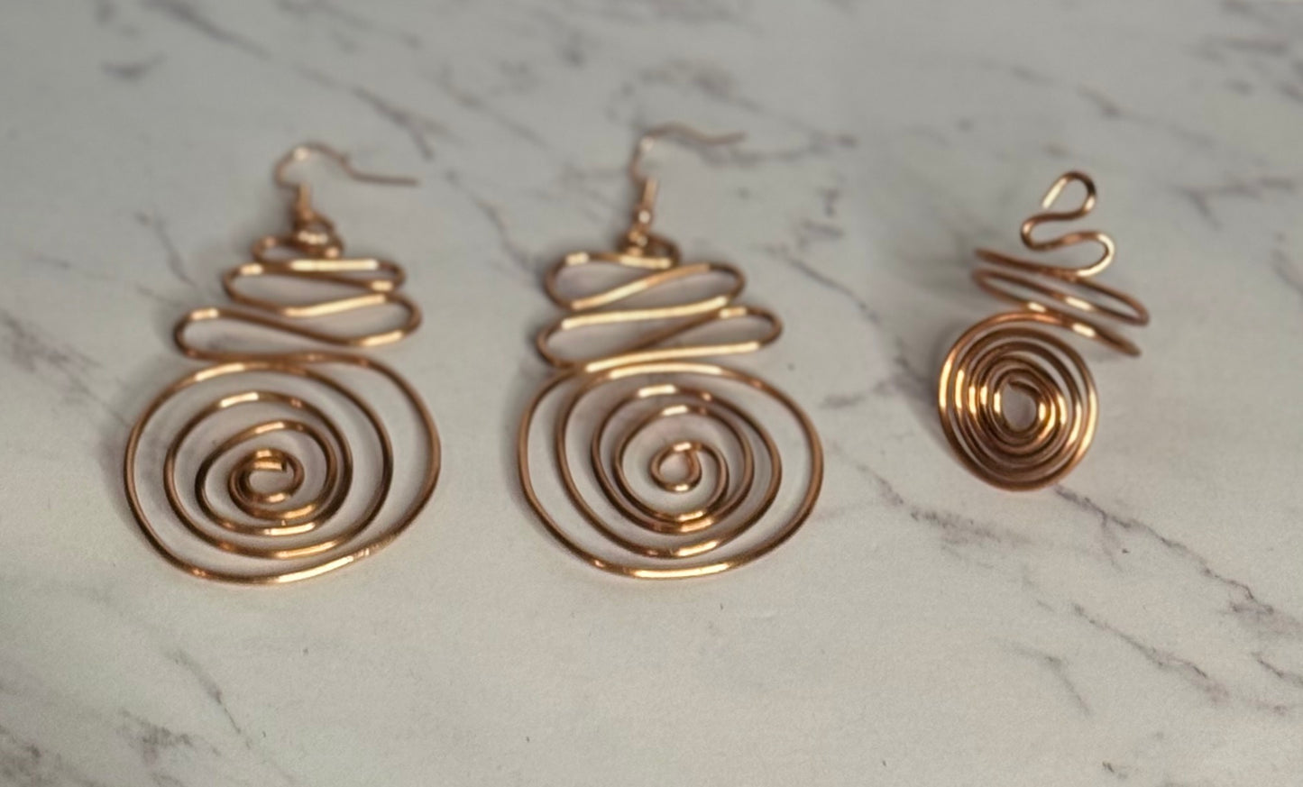 Spiral Ring In Gold Copper and Silver